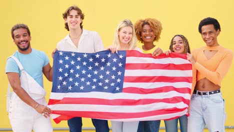 group of people holding american flag