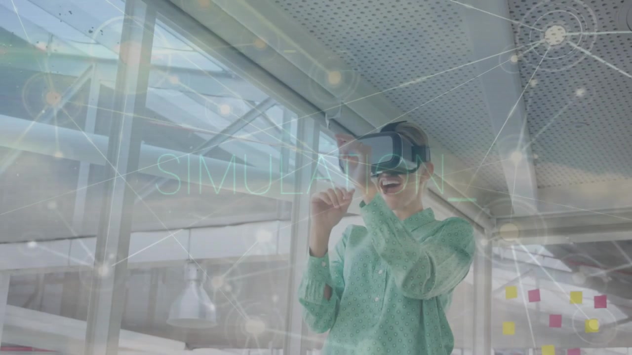 Woman wearing VR headset holding hands sensing interface, generating technology simulation nodes