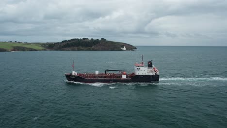 big heavy ship on a cloudy gloomy day, in slow motion