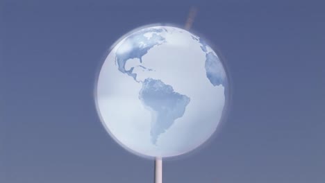 animation of globe over wind turbine