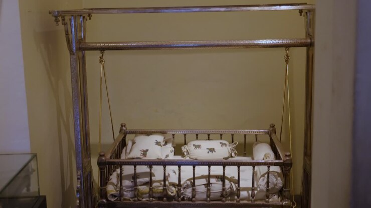 silver cradle for royal family at indoor