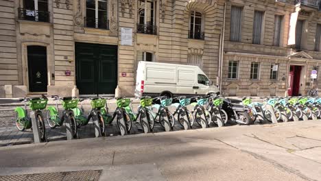 bikes parked at a rental station in paris