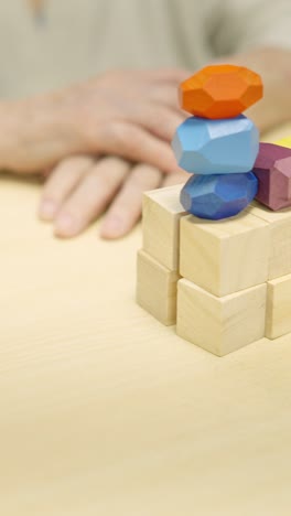 stacking wooden blocks