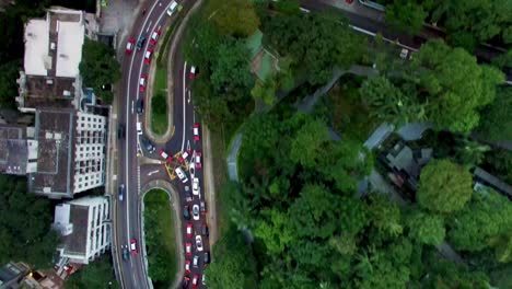 traffic on city road near victoria peak in mid-levels, hong kong island