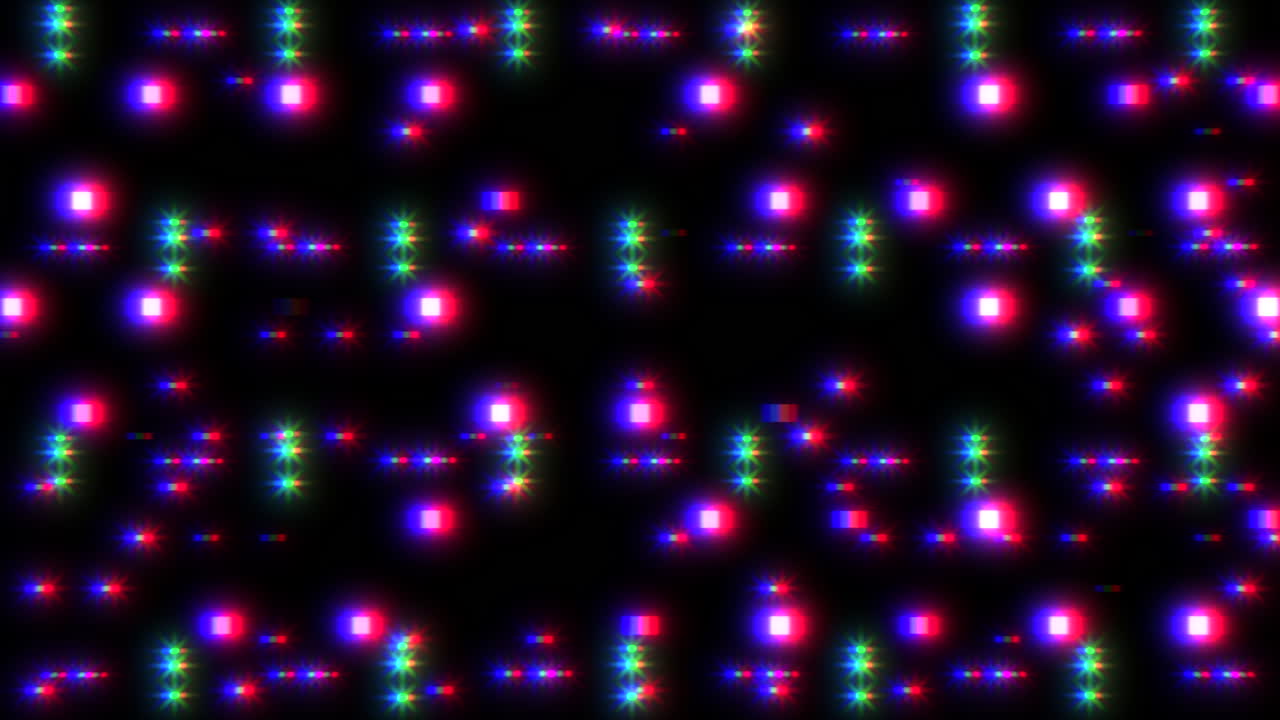 Colorful grid pattern of red, blue, and green dots on a black background