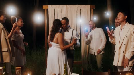 couple dancing at a night wedding reception