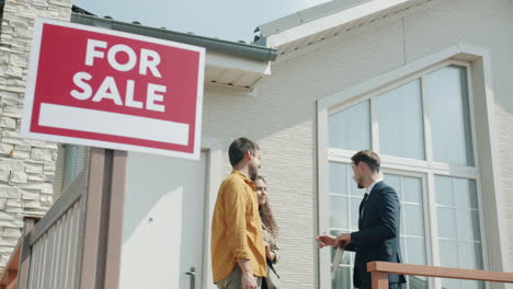 home buyer meeting with real estate agent