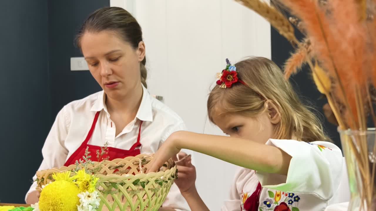 Mother and Daughter Crafting a Floral Arrangement