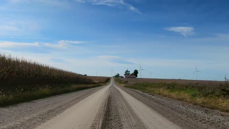 Point-of-view-footage-while-driving-down-a-gravel-road-in-rural-Iowa