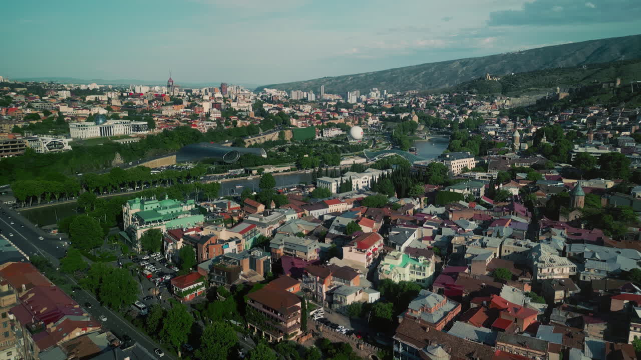 Aerial View of Tbilisi Cityscape with Kura River and Historic Buildings