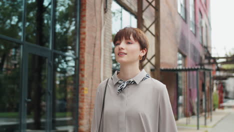 Cheerful-Girl-Walking-Outdoor-with-Shopping-Bags