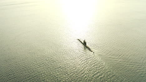 submarines travel above and below water