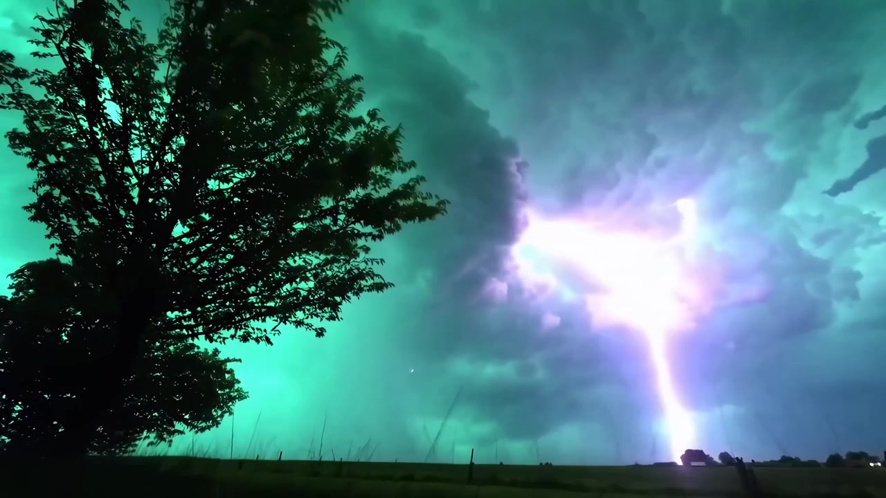 Intense Lightning Strikes Illuminate a Green Storm Cloud