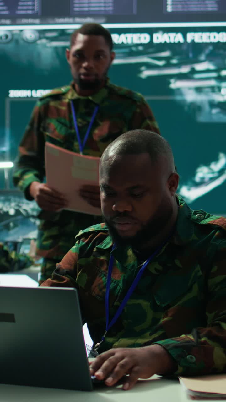 Vertical Video Army intelligence expert utilizes modern computer systems and satellite imagery