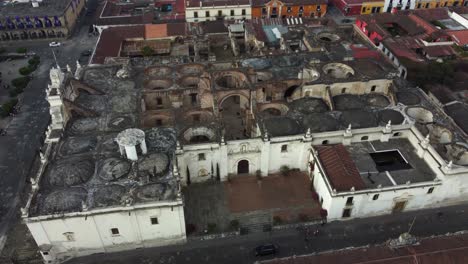 aerial orbits open roof of colonial antigua cathedral in guatemala