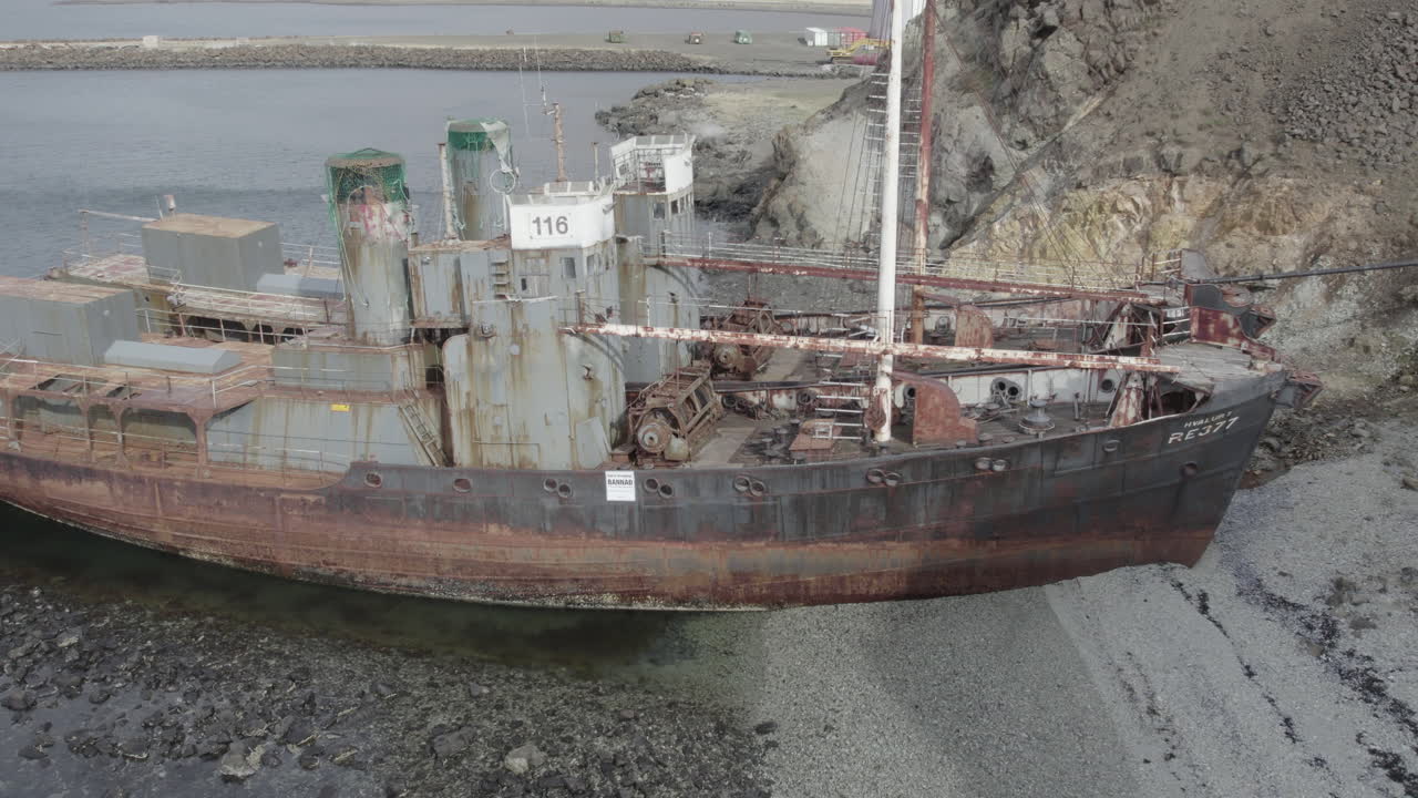 Fantastic aerial shot in distance of the abandoned whalers located in Hvalfj&ouml;r&eth;ur