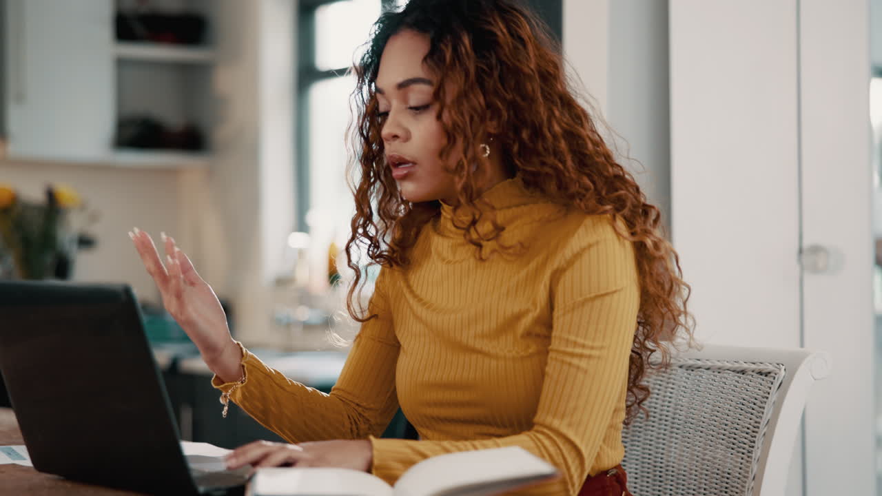Woman working from home on her laptop