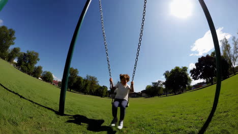 child playing at a sunny park playground