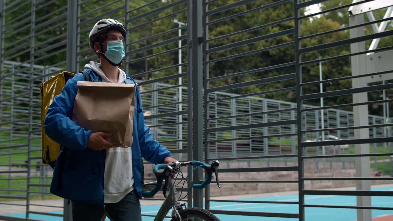 Food delivery courier with mask