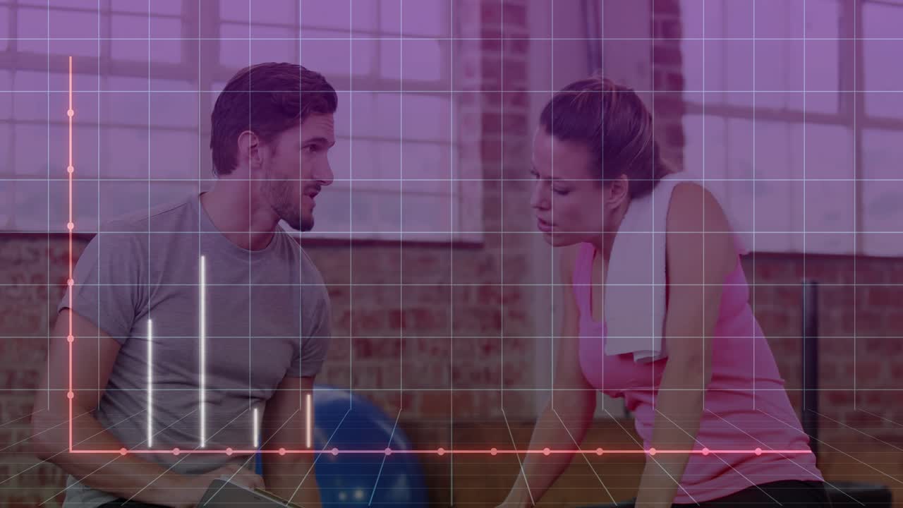 Coach tapping tablet starting live fitness chart with pink dots while client curling weight