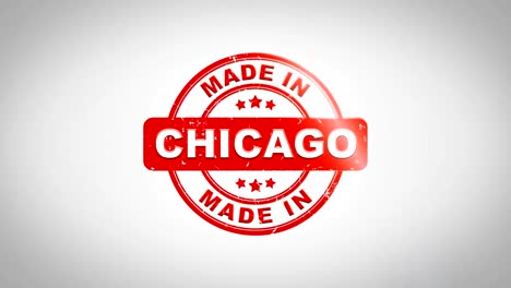 made in chicago  signed stamping text wooden stamp animation. red ink on clean white paper surface background with green matte background included.