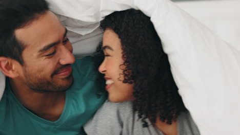 happy, love and couple with a smile in bed