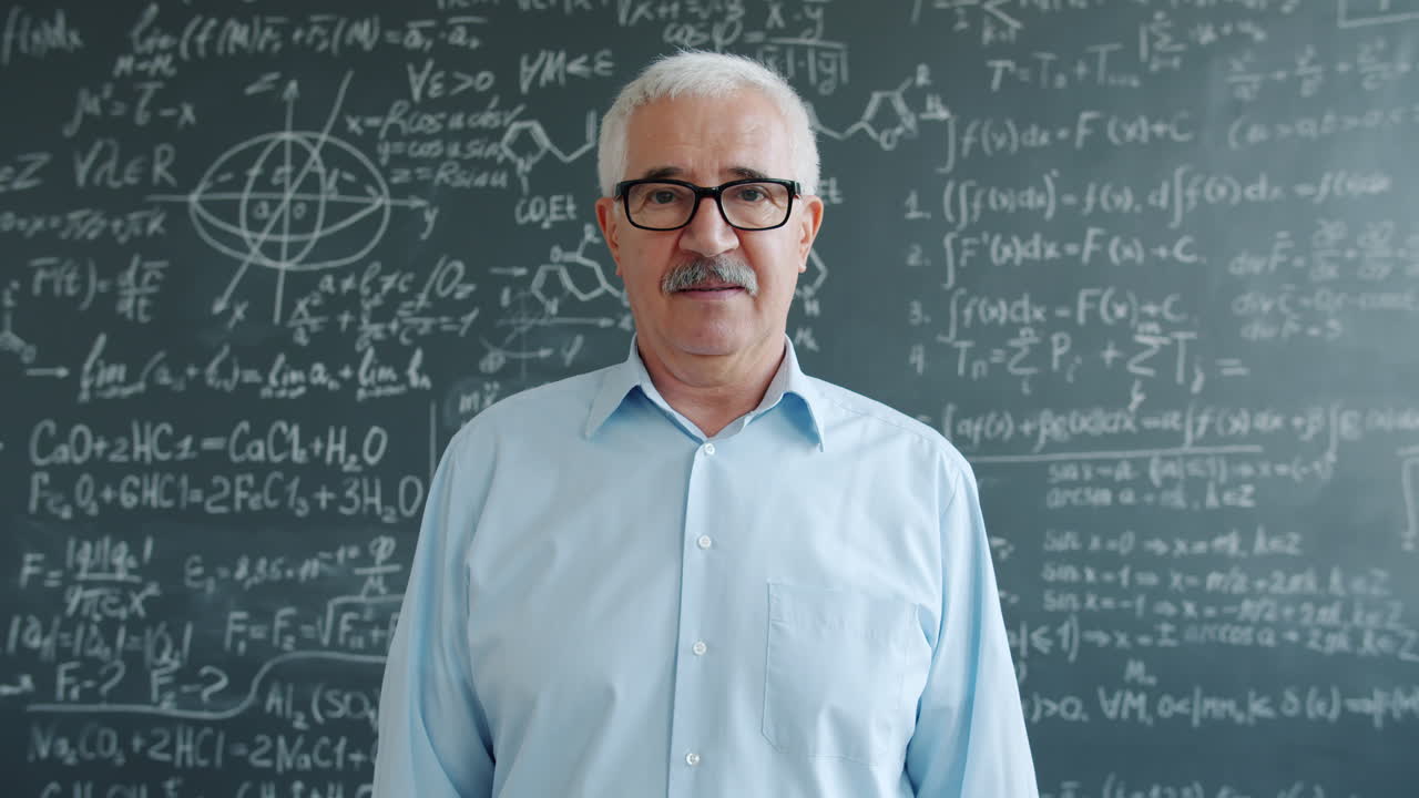 Teacher in Front of a Blackboard Full of Equations