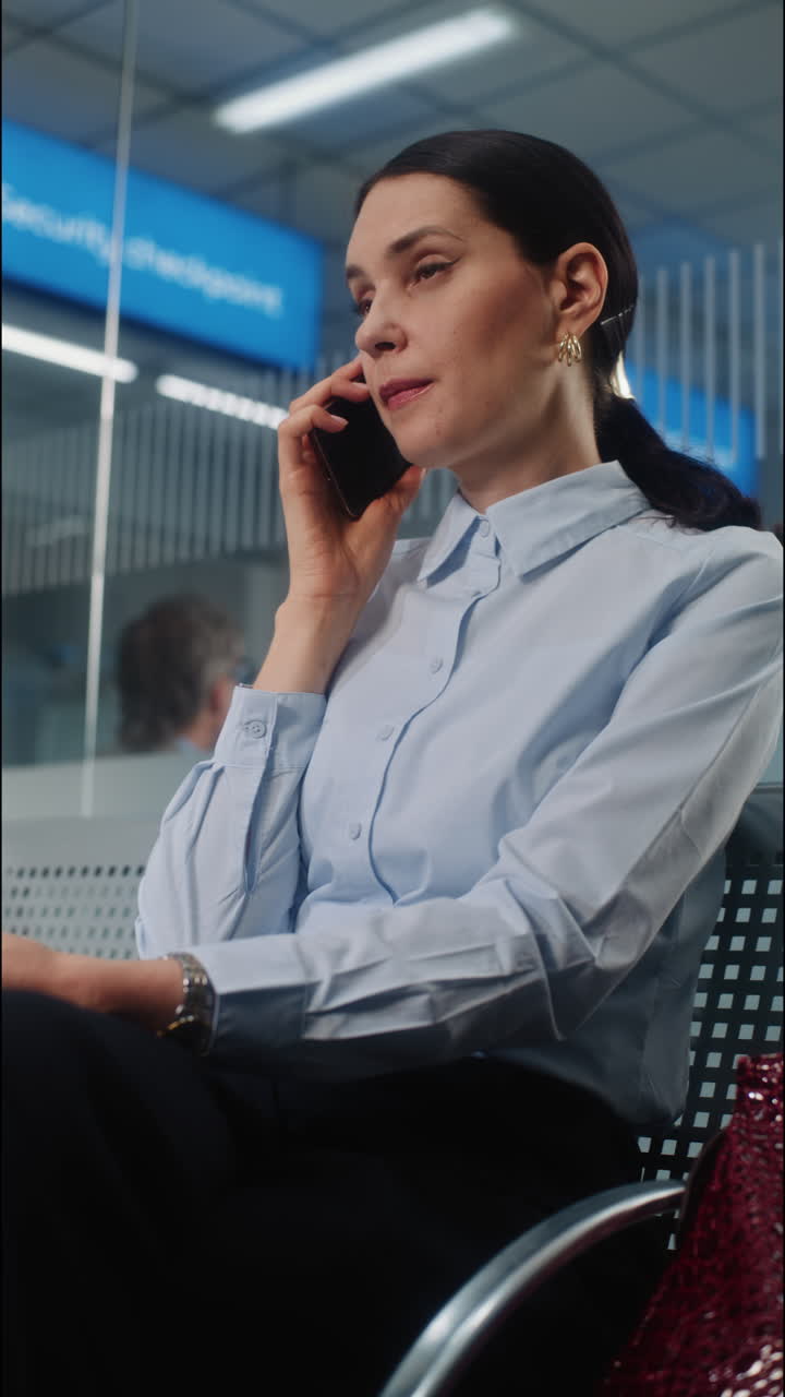 Businesswoman on Phone in Waiting Area