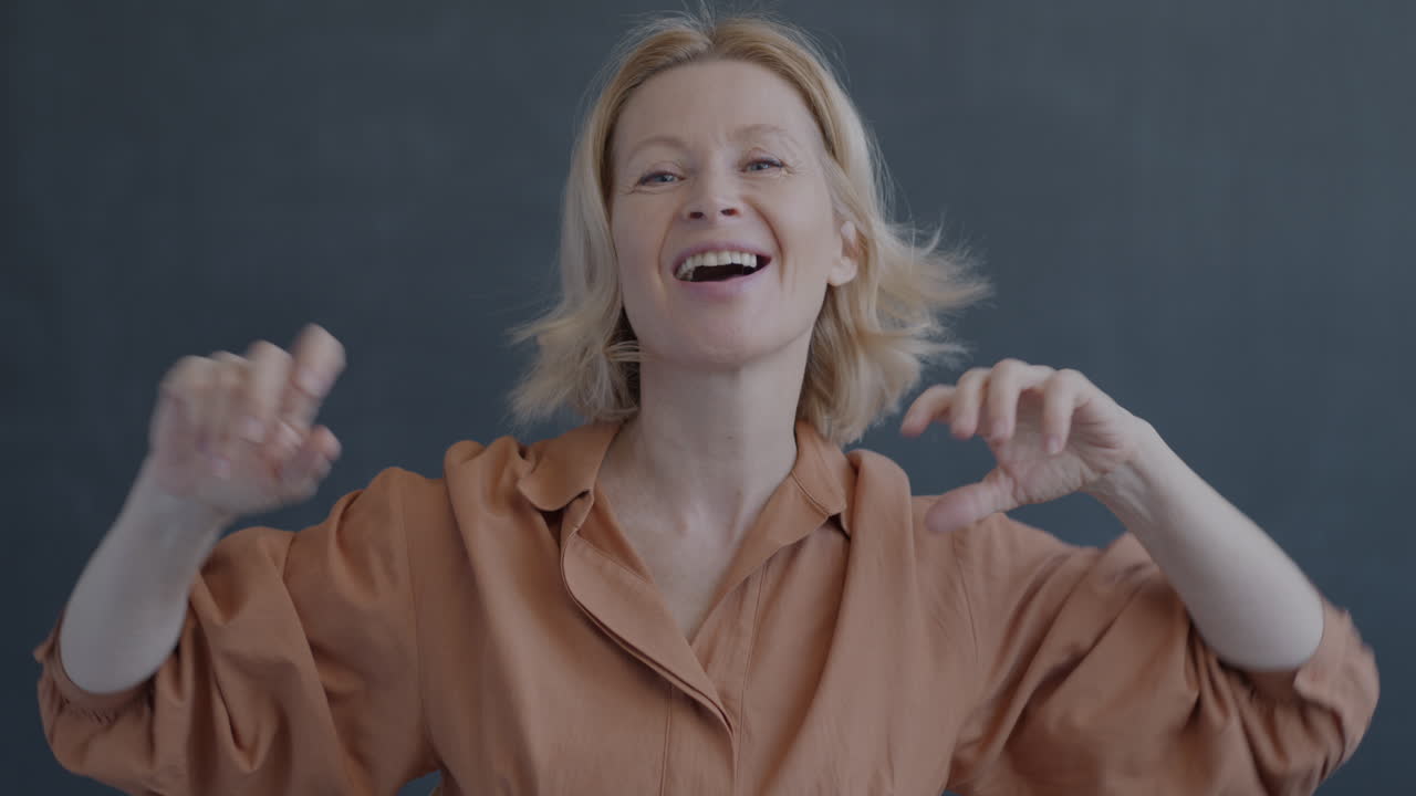 Smiling Senior Woman Dancing