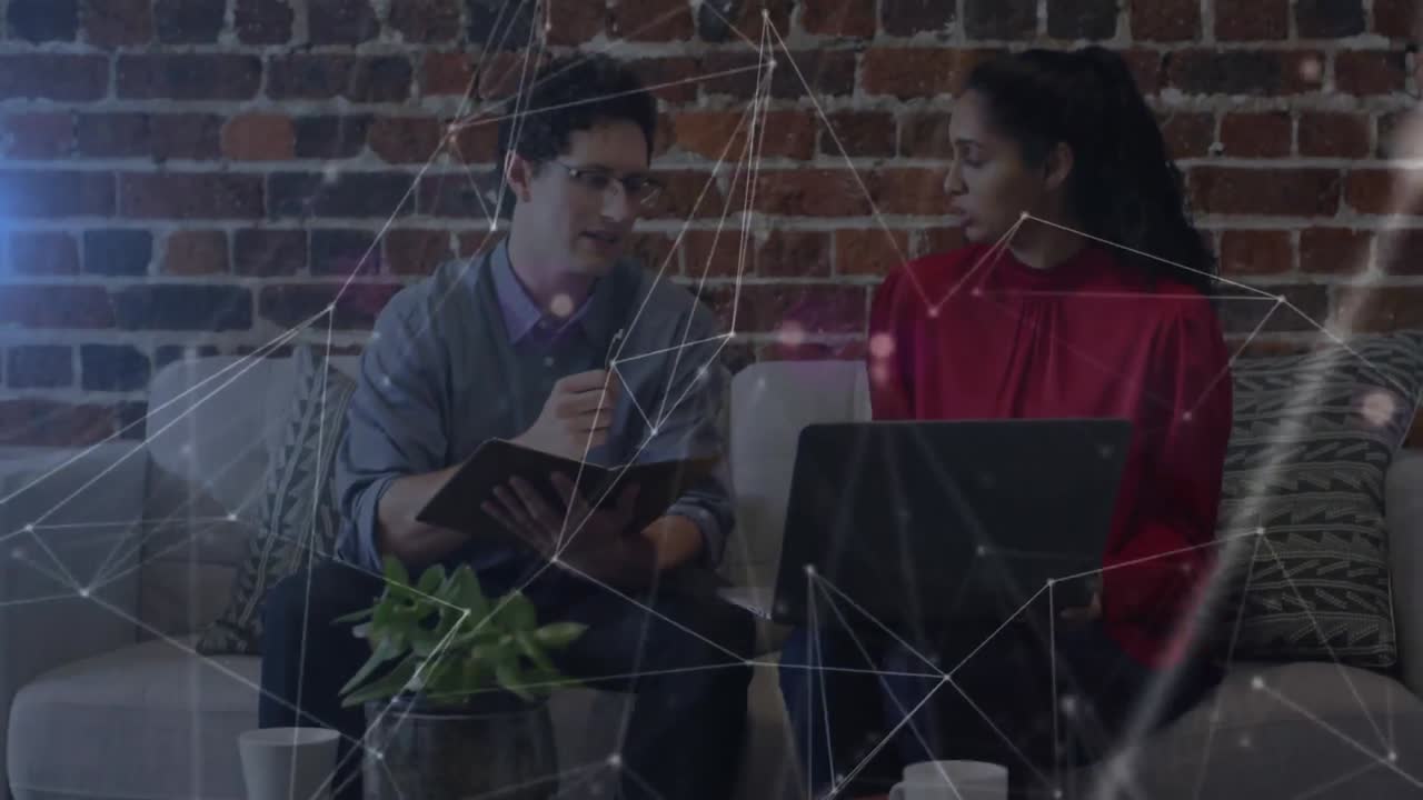 Network of connections against diverse office colleagues discussing together at office