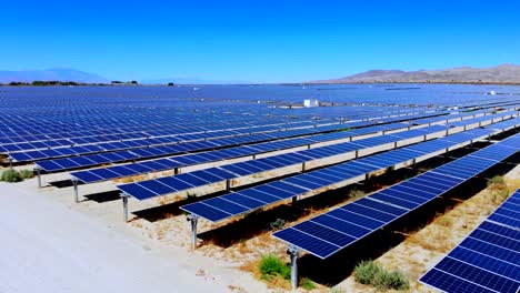 aerial view of a large solar farm in the desert