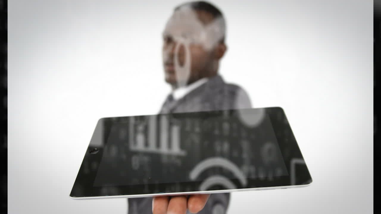 Animation of network of digital icons over businessman holding tablet in office