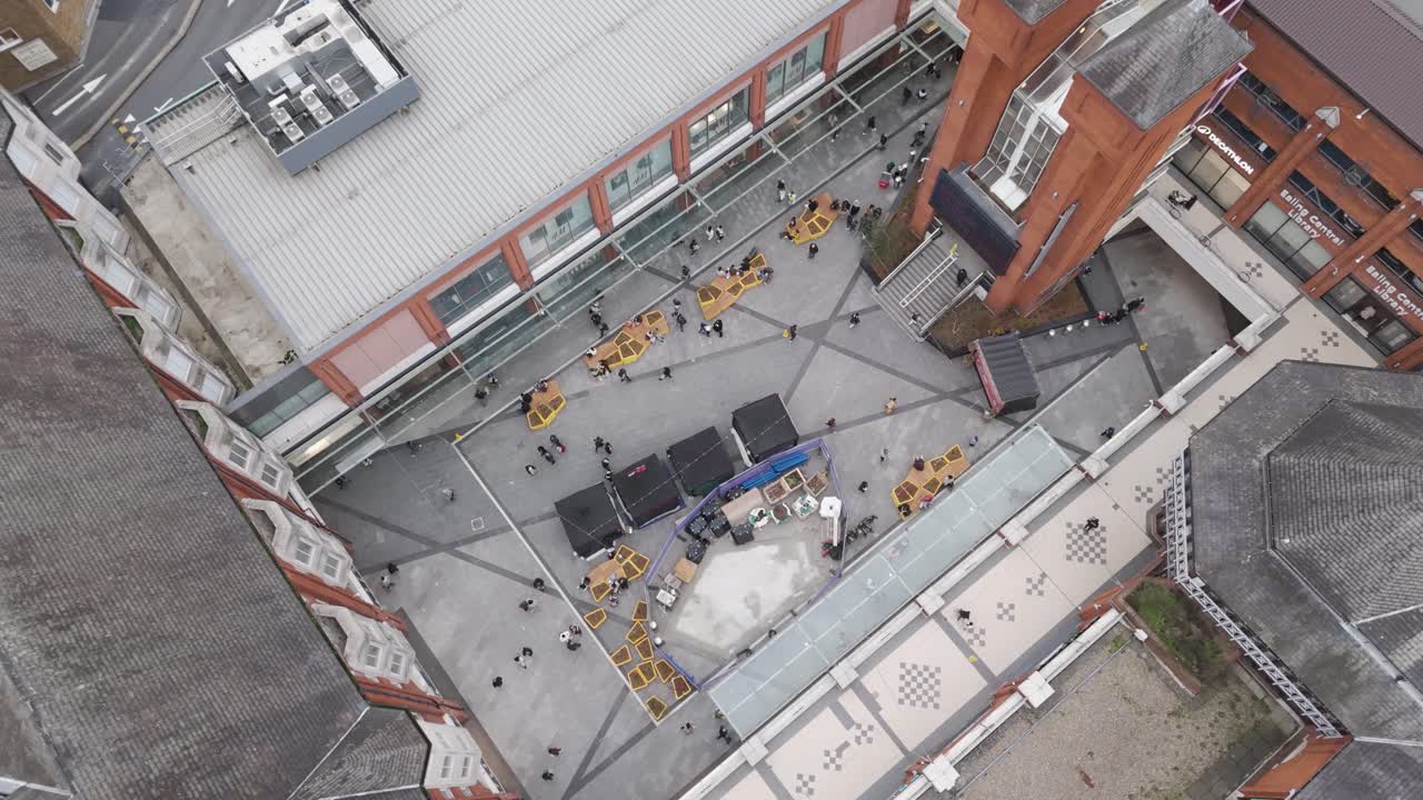 Top-down aerial perspective of Ealing Broadway Shopping Centre revealing retail architecture in Ealing, London, UK, October 2024
