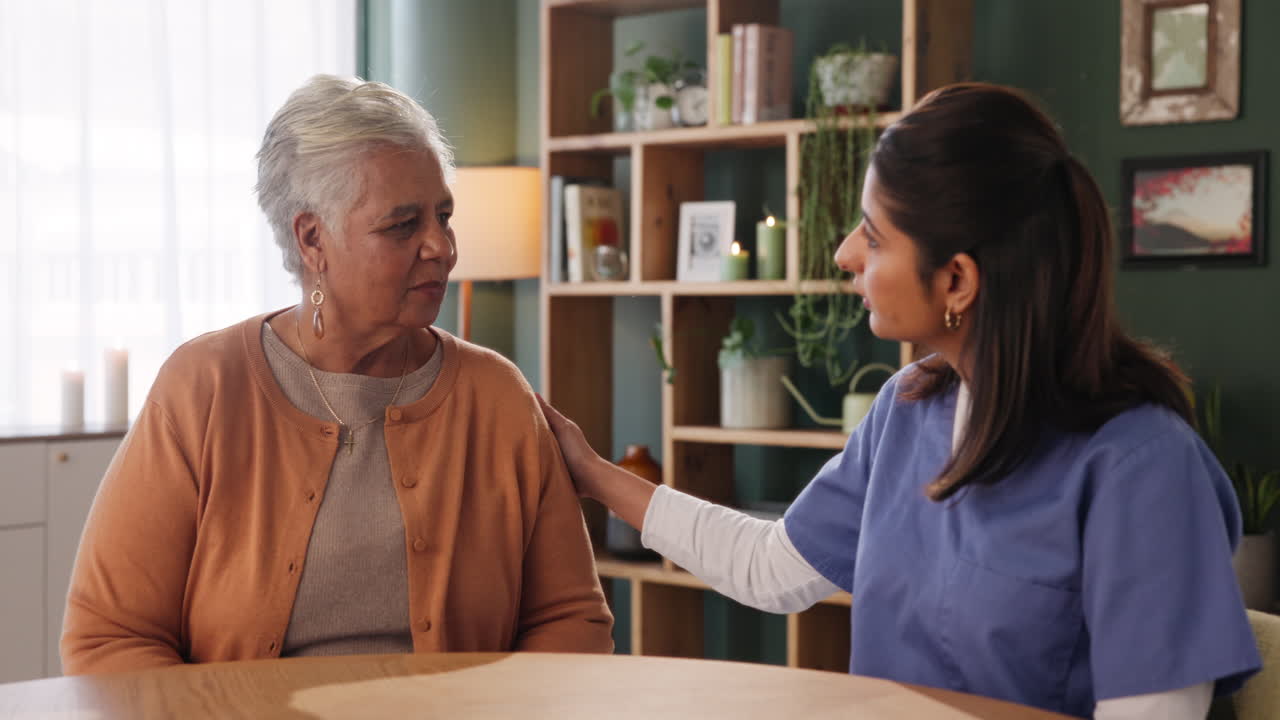Elderly Woman Receiving Home Care from Caregiver