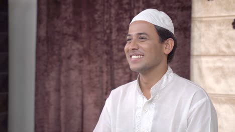 happy indian muslim man smiling