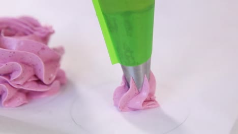 decorating pink berry whipped cream treats