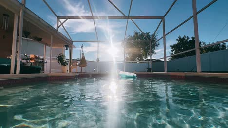 sun-drenched backyard pool