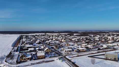 cinematic drone shot of city of silute living society landscape in winter, lithuania