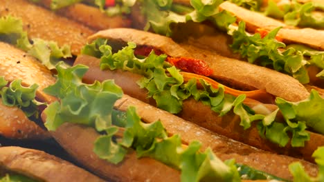 assortment of fresh sandwiches with lettuce and fillings