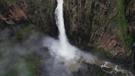 drone shot of stunning wallaman falls, unesco world heritage site, queensland, australia