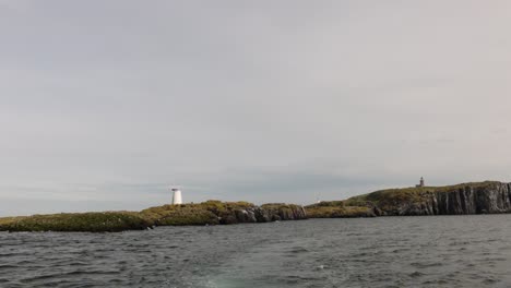 sailing away from the isle of may after visiting for a day trip