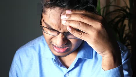 man experiencing stress or frustration