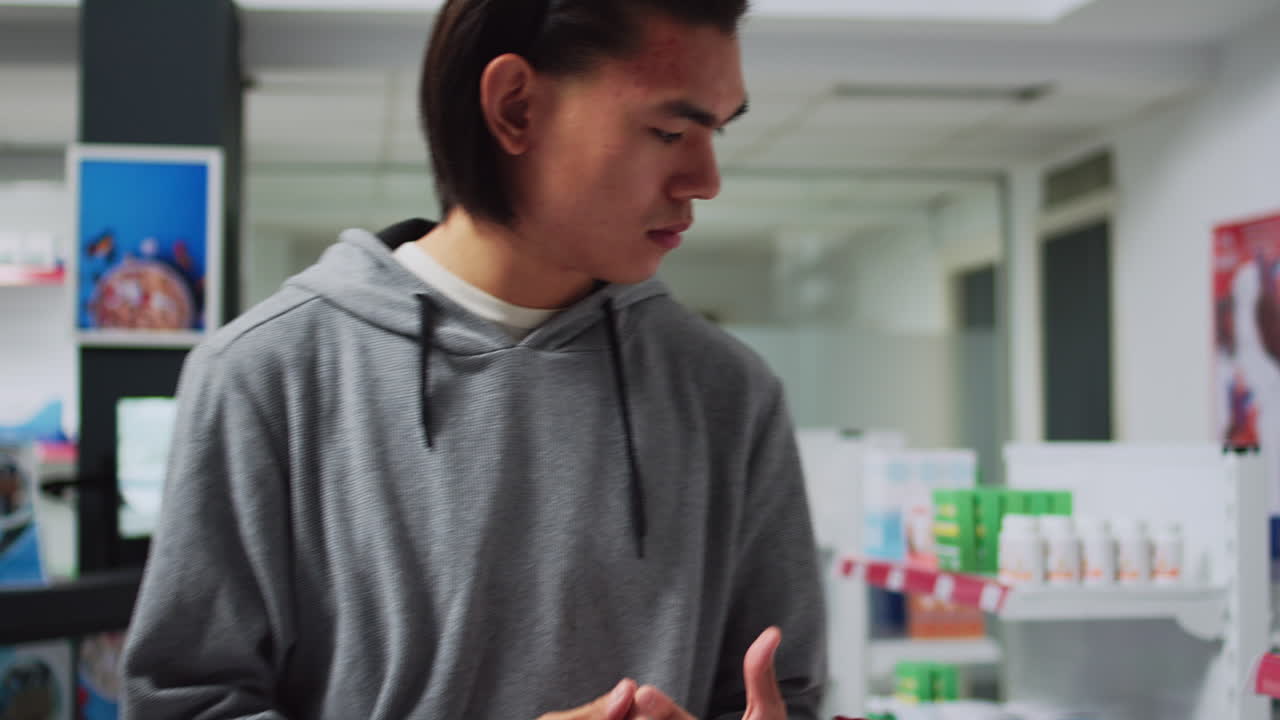 Customer Shopping for Medication in Pharmacy