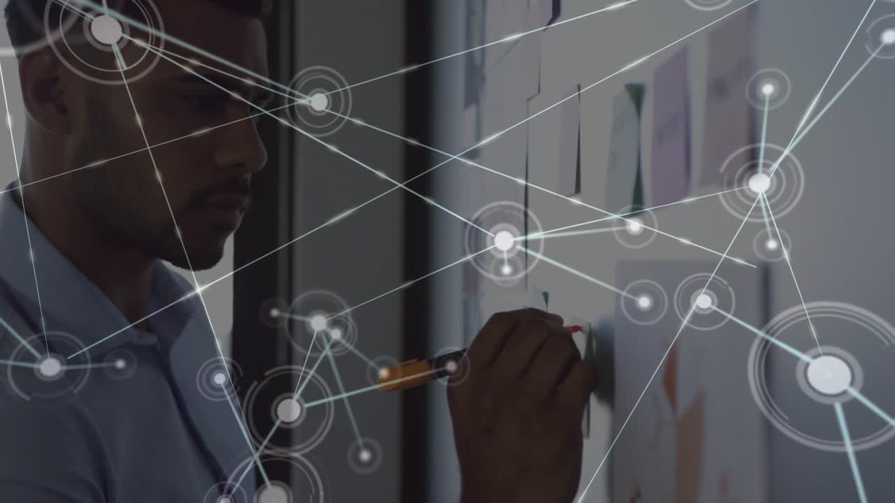 Businessman selecting marker, annotating board and expanding network overlay mapping strategy