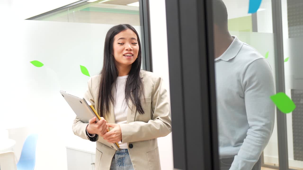 Two Colleagues in Office Discussing Work