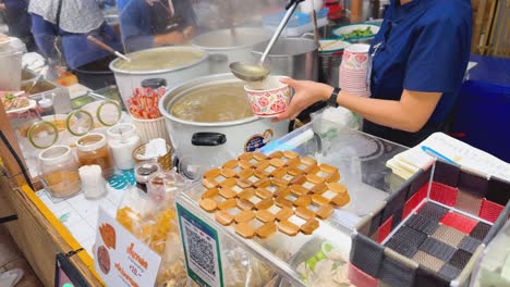 food stall with noodle soup