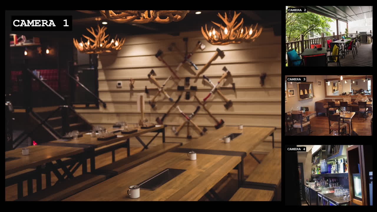 야외 테라스와 함께 바와 레스토랑 내부의 네 개의 보안 카메라 뷰, 느린 동작