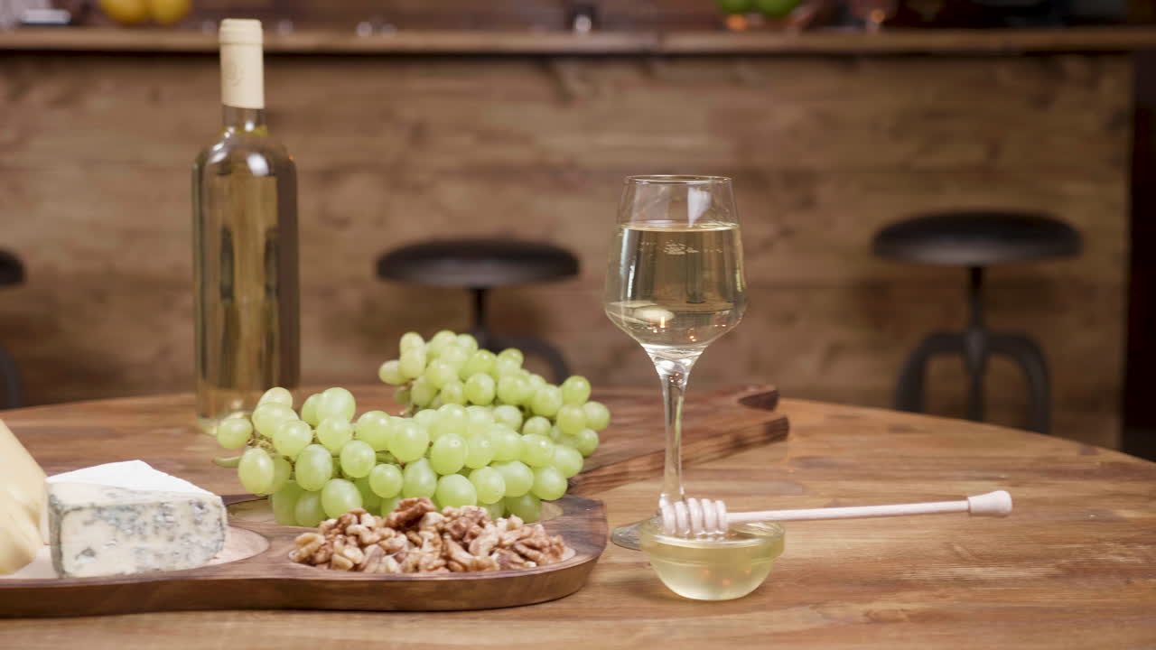 Grapes, Cheese, and White Wine Still Life