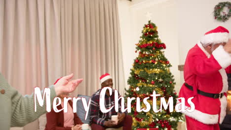 animation of merry christmas text over diverse senior friends dancing at christmas at home