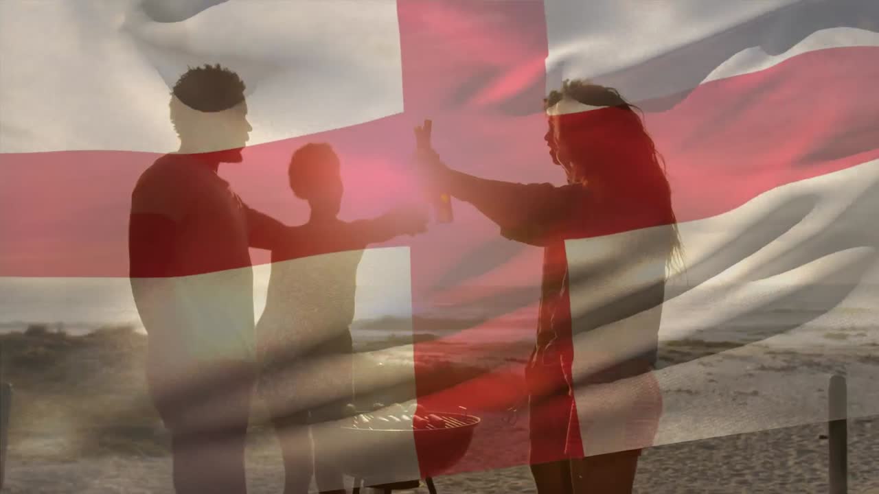animación de ondear la bandera de inglaterra sobre un grupo de amigos en la playa